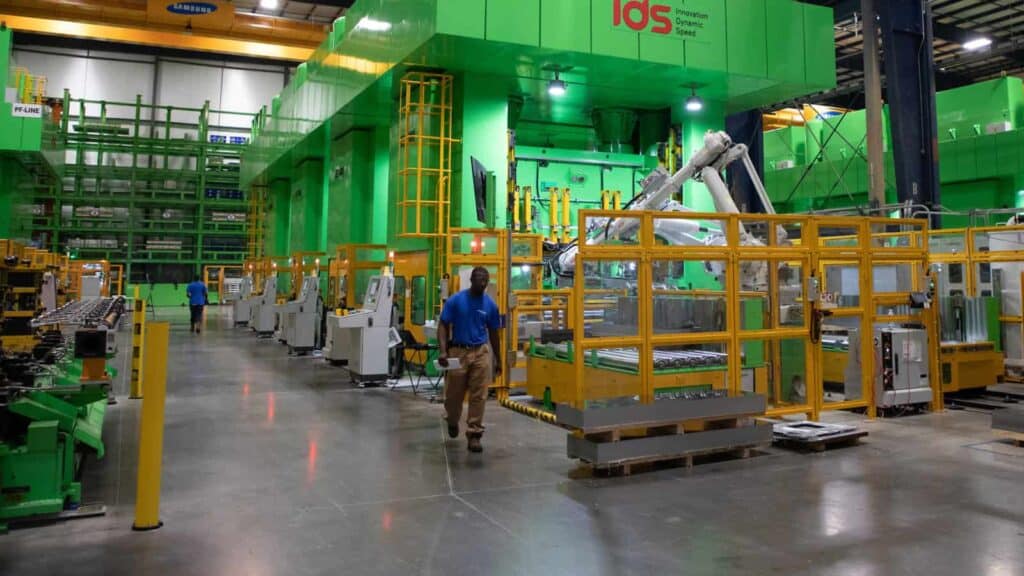 Automated manufacturing equipment in a modern industrial facility.